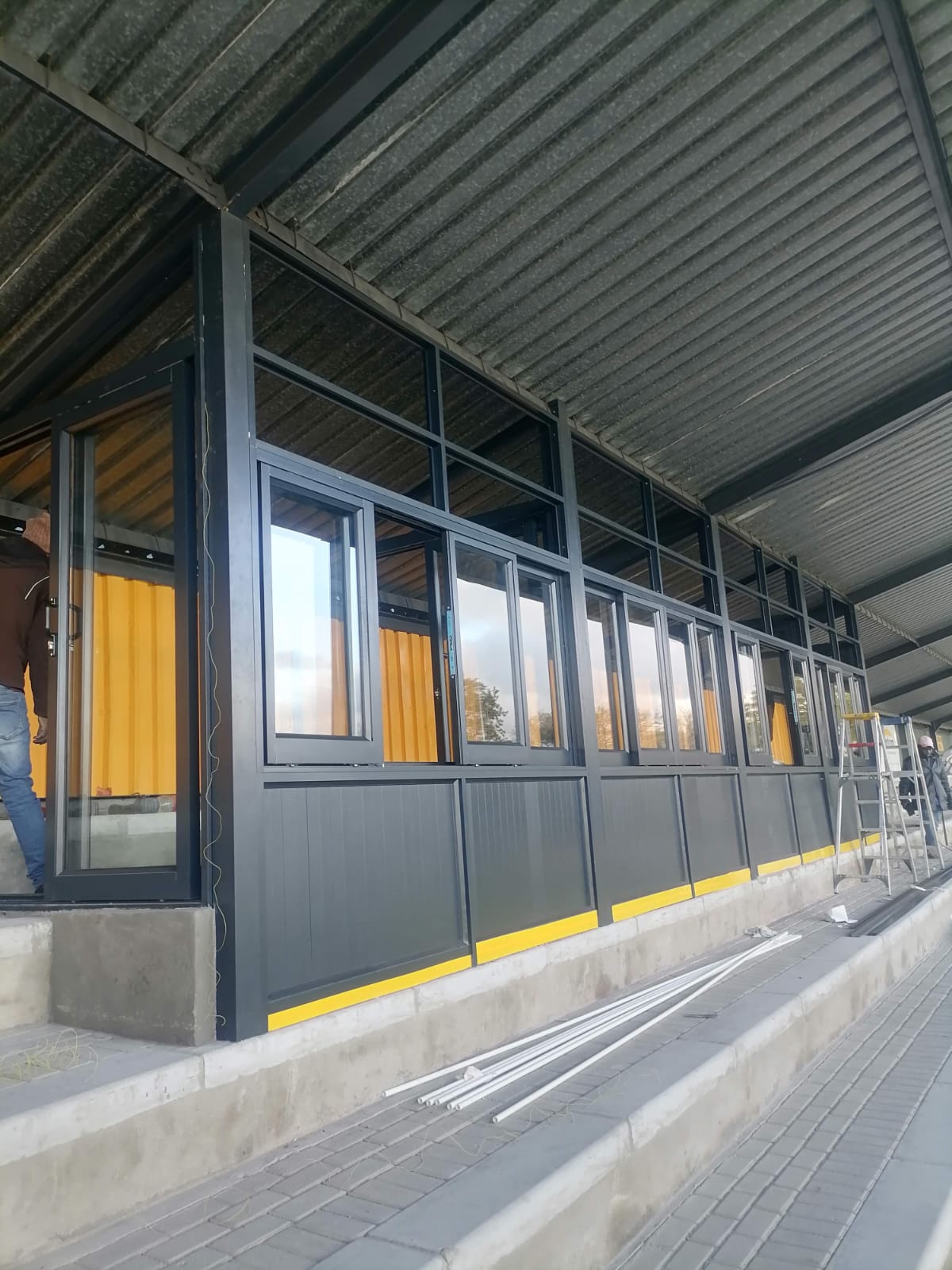 Aluminium sliding windows fitted on the front of Paarl Gymnasium High School stadium building.