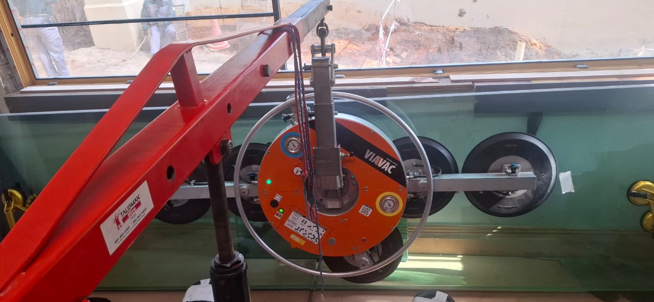 Aluminium cutting and assembly machinery inside Walden Aluminium production workshop.