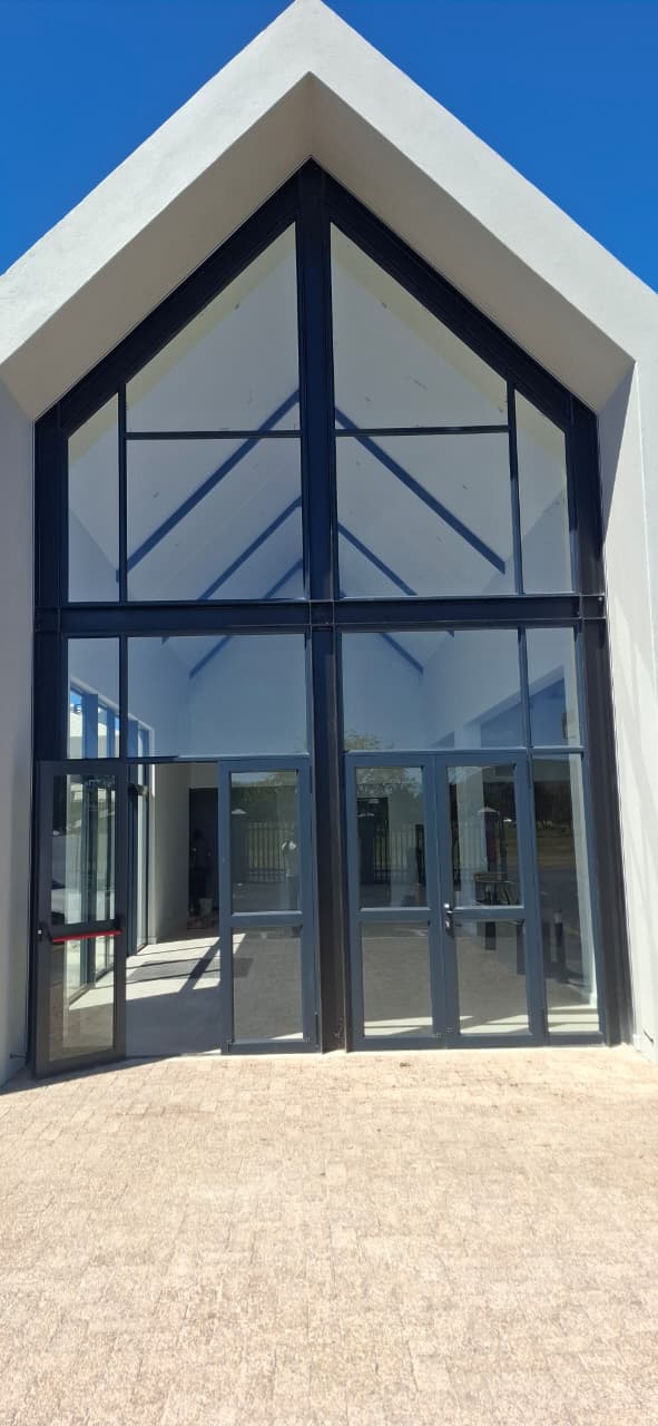 Large aluminium and glass entrance door at Uban Church, Durbanville.